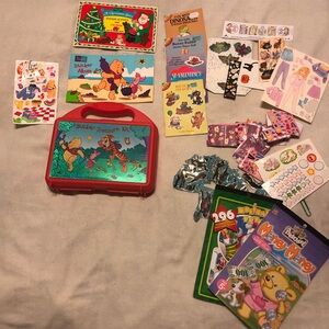 Vintage Winnie the Pooh Sandylion sticker case with various stickers